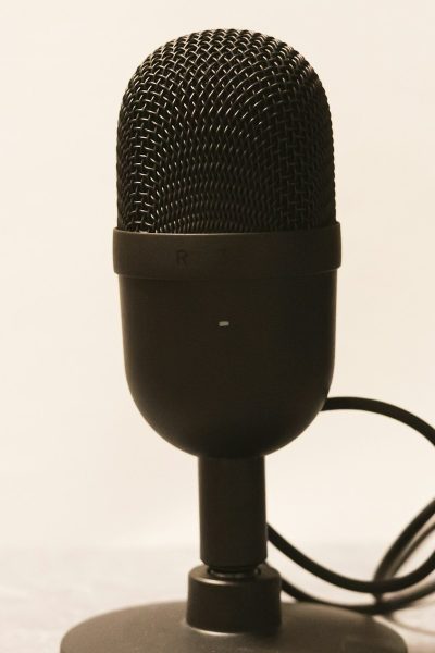 a microphone is plugged into a charger
